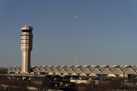 Near-collision investigation reveals Reagan National Airport controllers failed to stop flights during military flyover