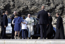 Pope Francis is greeted at the Italian island of Lampedusa to highlight the plight of migrants crossing the Mediterranean. This was his first trip outside of Rome.