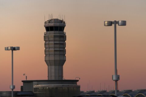 Collision warning sounds in cockpit of Delta plane due to close call with Air Force jet near Reagan National Airport