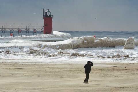 Winter-weary East Coast hit with another storm as temperatures plunge elsewhere